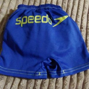 Speedo diaper lined bathing shorts.Onesies.